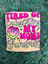 Load image into Gallery viewer, Tired of Babysitting My Mom’s GrandKids Tee
